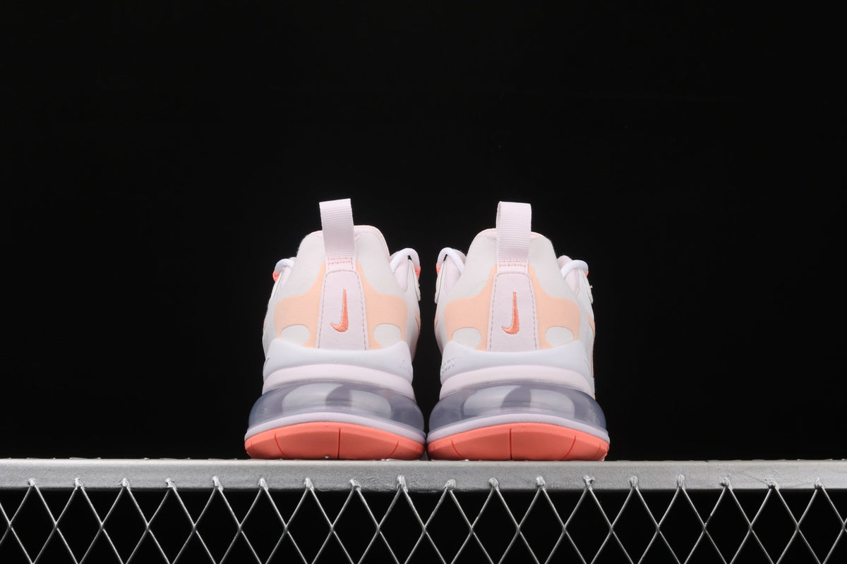 Nike Air Max 270 React in the Summit White/Crimson Tint colorway CJ0619-103