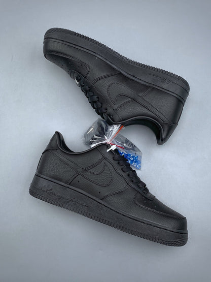 Black low-top sneakers, pair view
