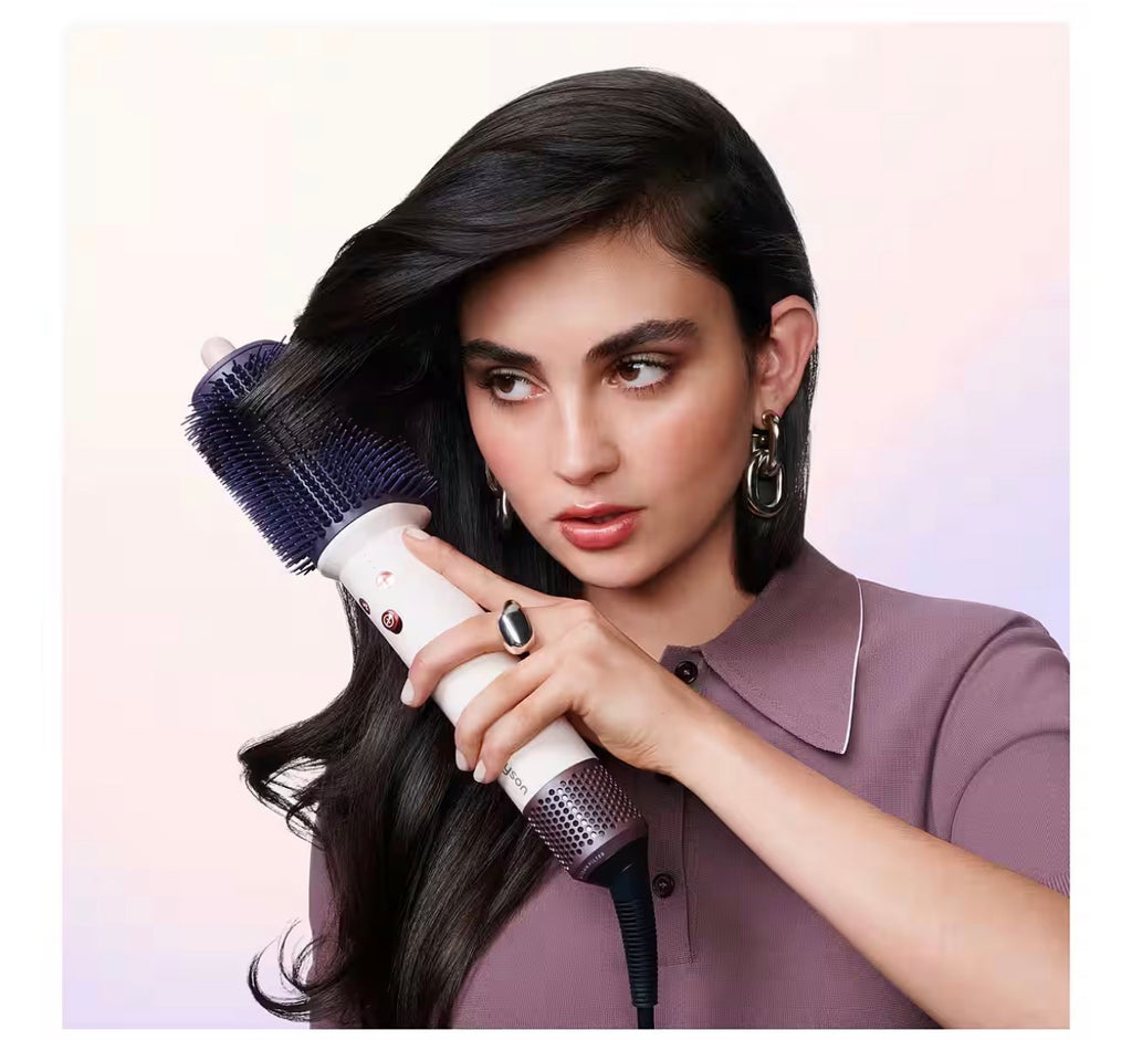 Dyson Airsmooth styling brush in ceramic pink, supplied product photograph