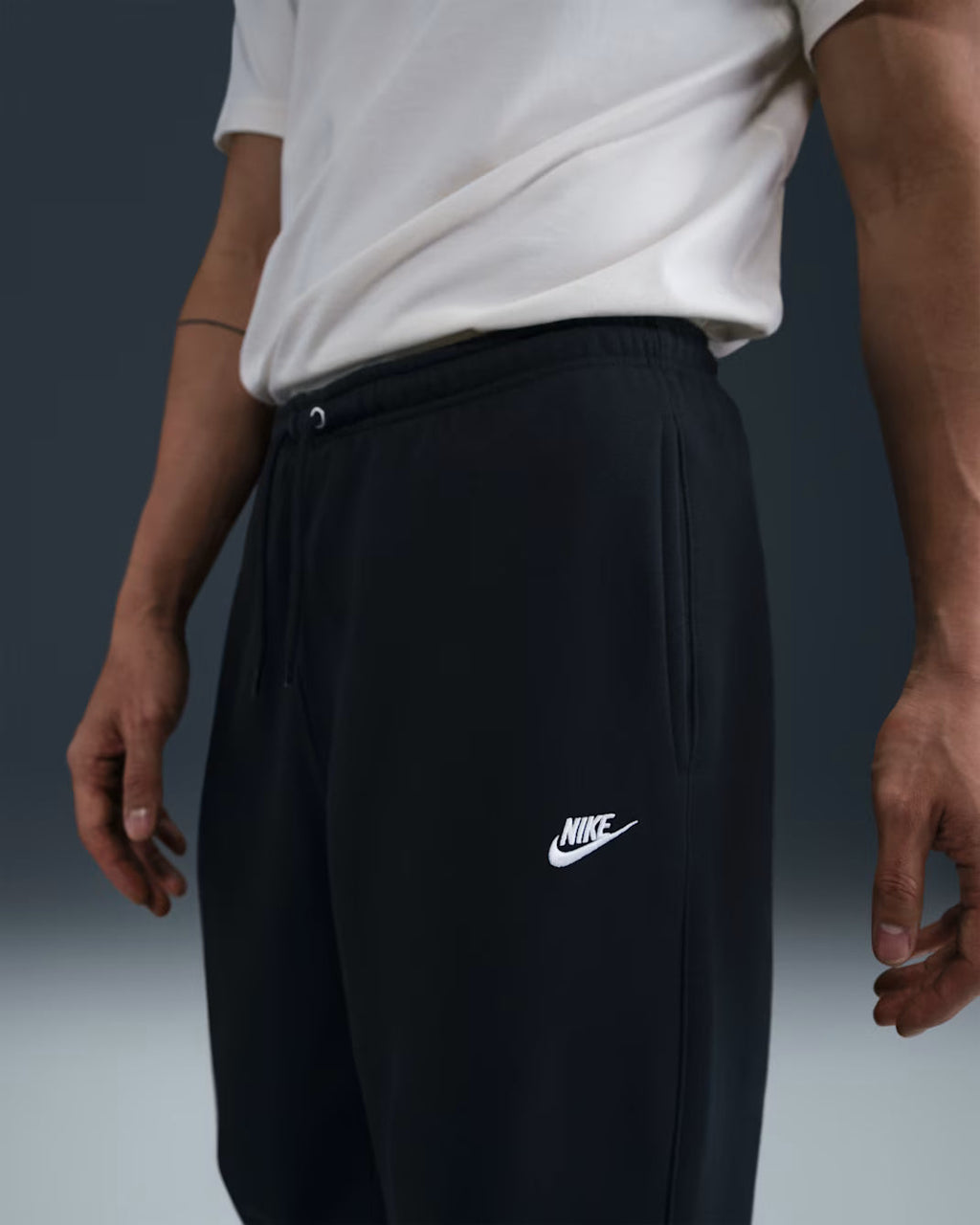 Nike Club Fleece trousers with raw hem (men's)