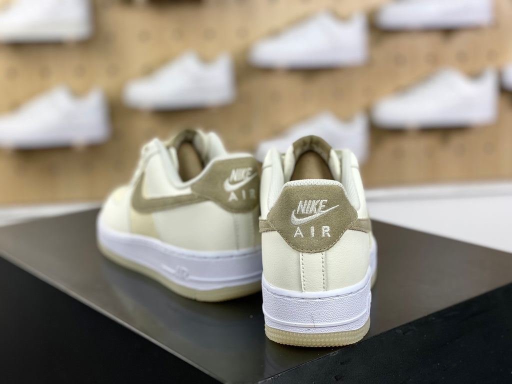 Cream and khaki low-top sneakers with white midsole