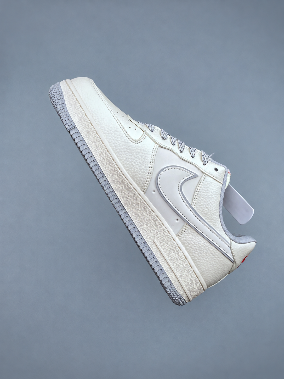 White low top sneaker, hand removed from supplied photo