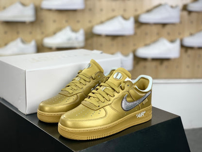Metallic gold low-top sneakers, pair front view