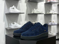 Navy low-top sneaker pair