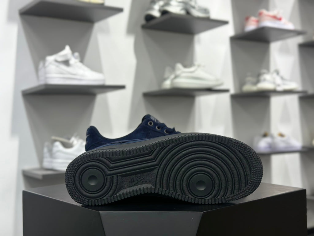 Navy low-top sneaker black outsole