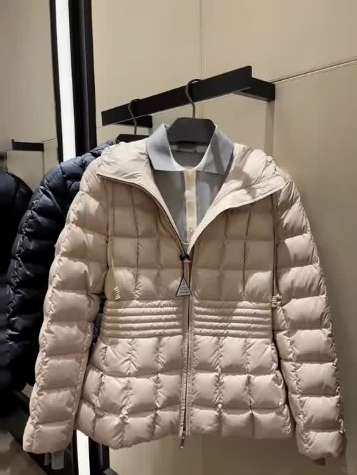 Fitted Hooded Quilted Jacket photographed in supplied video