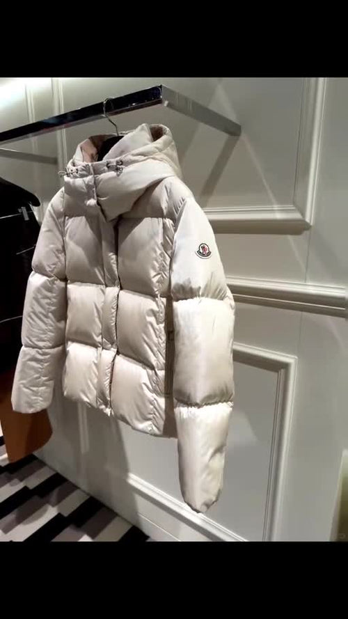 Cream Hooded Puffer Jacket photographed in supplied video
