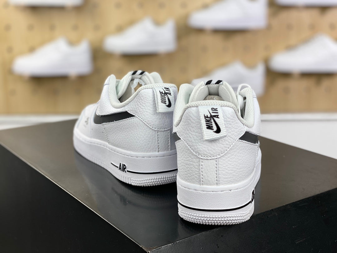 White and black low-top sneakers product detail