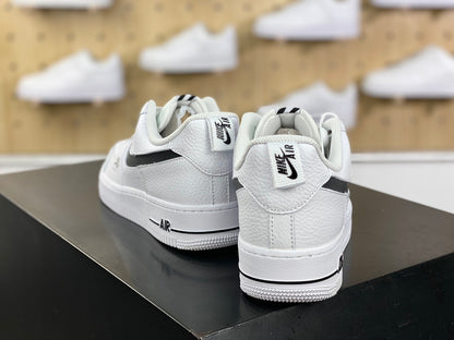 White and black low-top sneakers product detail