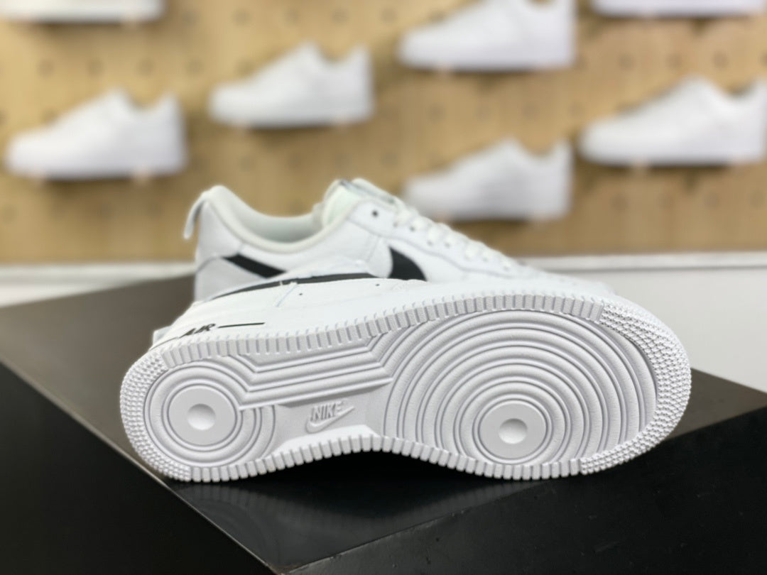 White and black low-top sneakers product detail