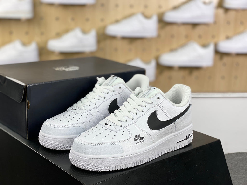 White and black low-top sneaker pair